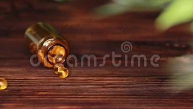 维生素补充丸欧米茄3。 木制桌子上有鱼肝油药品。 鱼油胶囊